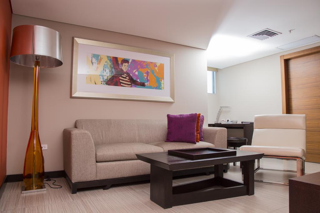 Megapolis Hotel Panama Dış mekan fotoğraf A living room
